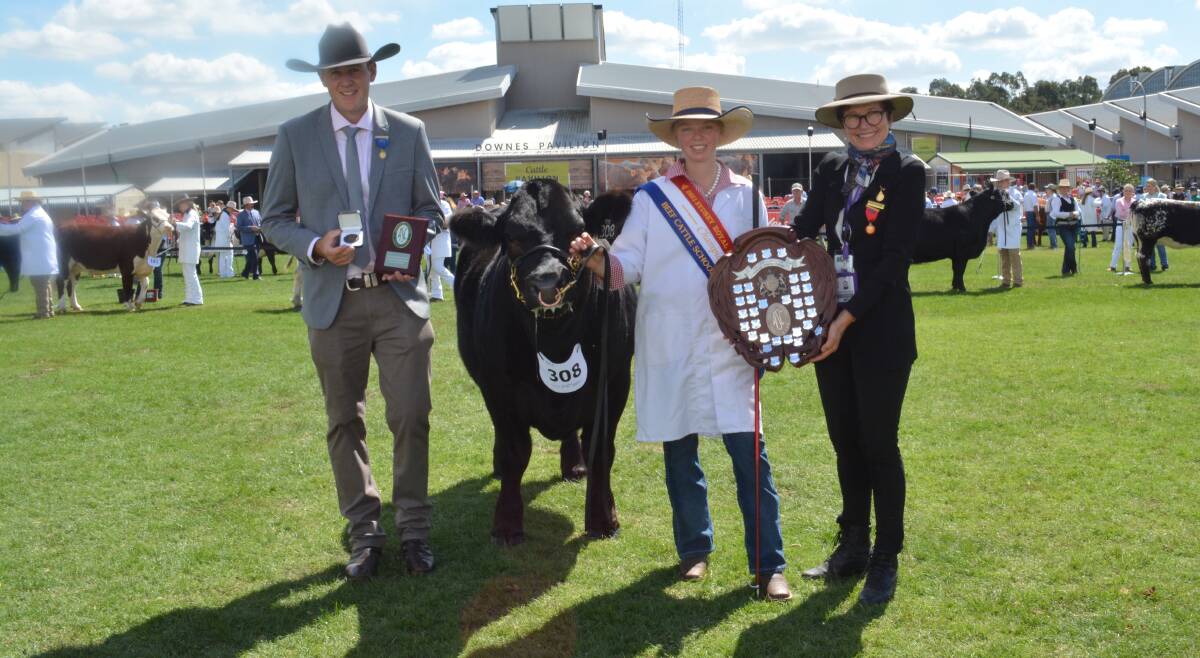 Judge Harris Thompson, Venturon Livestock, Boyup Brook, WA, with the champion school parader Felicity Webb, Scots All Saints College, Bathurst, and RAS councillor Janie Forest, Mittagong. 