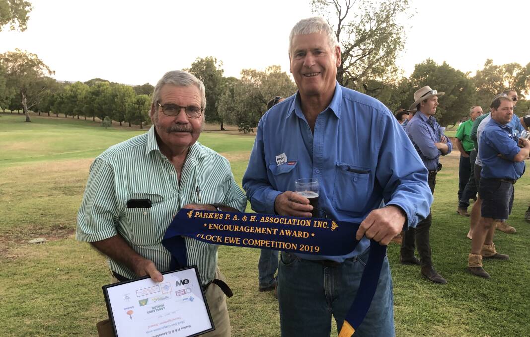 Parkes Maiden Ewe Compeition encouragement award winner Roger Hood, Cherry Gardens, Parkes, with his long-time sheep classes Andy McLeod. Photos supplied. 
