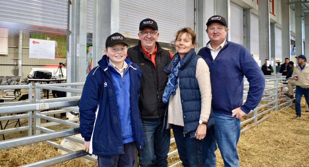 Cameron, Peter, Julie and Jack Gordon of Quartz Australian White stud, Forbes, paid the second-top price of $20,000 in the ewes for Tattykeel 210386, sold with six embryos by Tattykeel 200085. In all they bought eight ewes, two rams. 