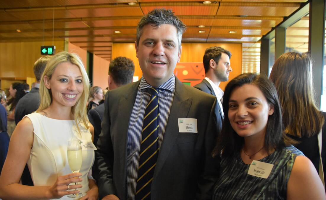 Kathleen Curry and Isabella McDougall from NSW Farmers with the DPI's Brett Fifield at the Farmer of the Year announcement at NSW Parliament House on Monday.