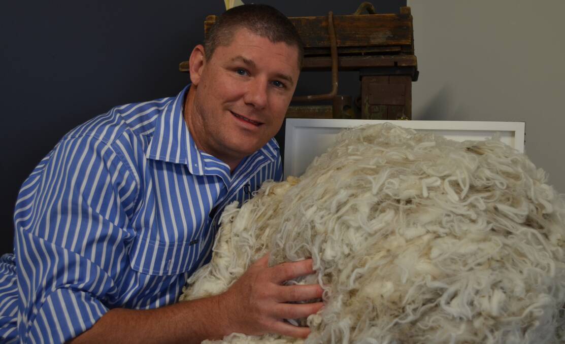 OPTIMISTIC OUTLOOK: Trent Fordham of Riverina Wool Testers in Wagga welcomes the high prices.  Picture: Nikki Reynolds