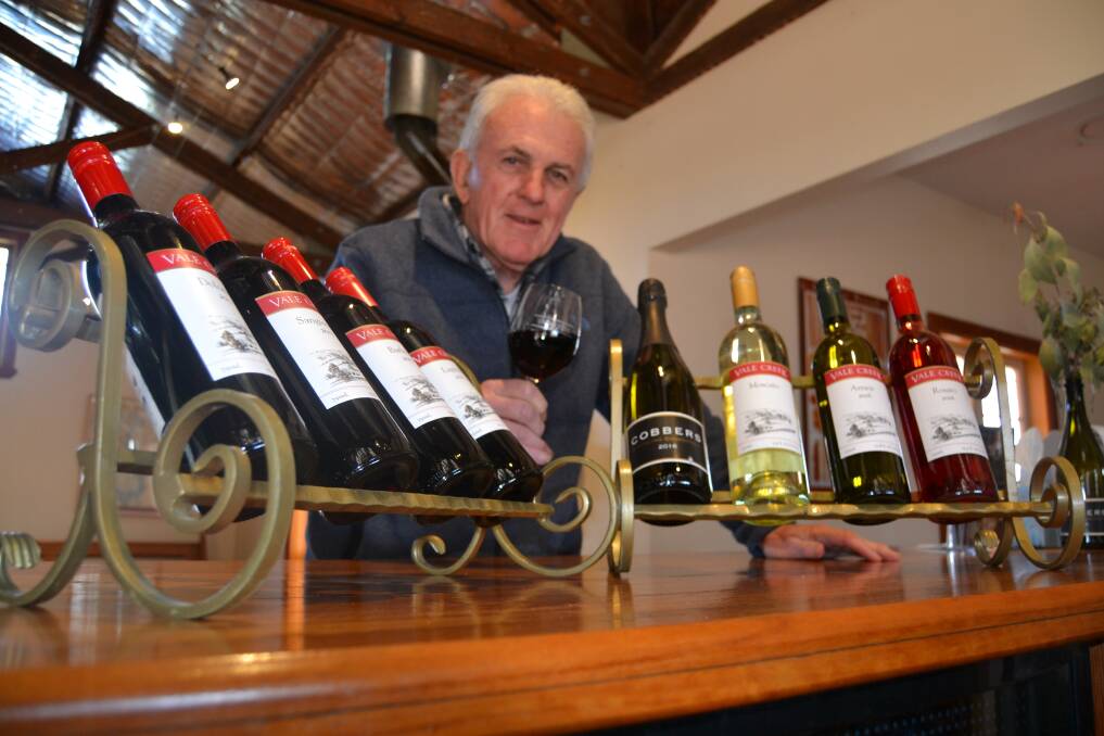 FINE WINES: Tony Hatch with some of Vale Creek Wines' produce ahead of Saturday night's Brew and Bite. Photo: BRADLEY JURD 070617bjwine