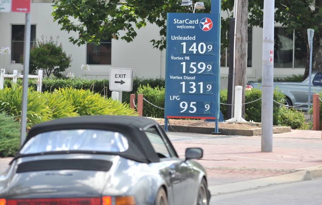 HARD TO EXPLAIN: The price of fuel in Orange varied by at least 10 cents on Monday as Central West towns continued to be among the state's most expensive for unleaded petrol. Photo: JUDE KEOGH 0206jkpetrol2