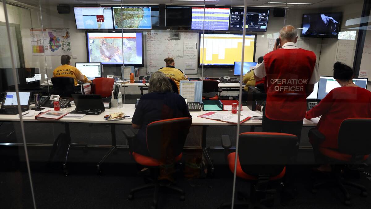 ON HIGH ALERT: NSW Rural Fire Service crews on Sunday.