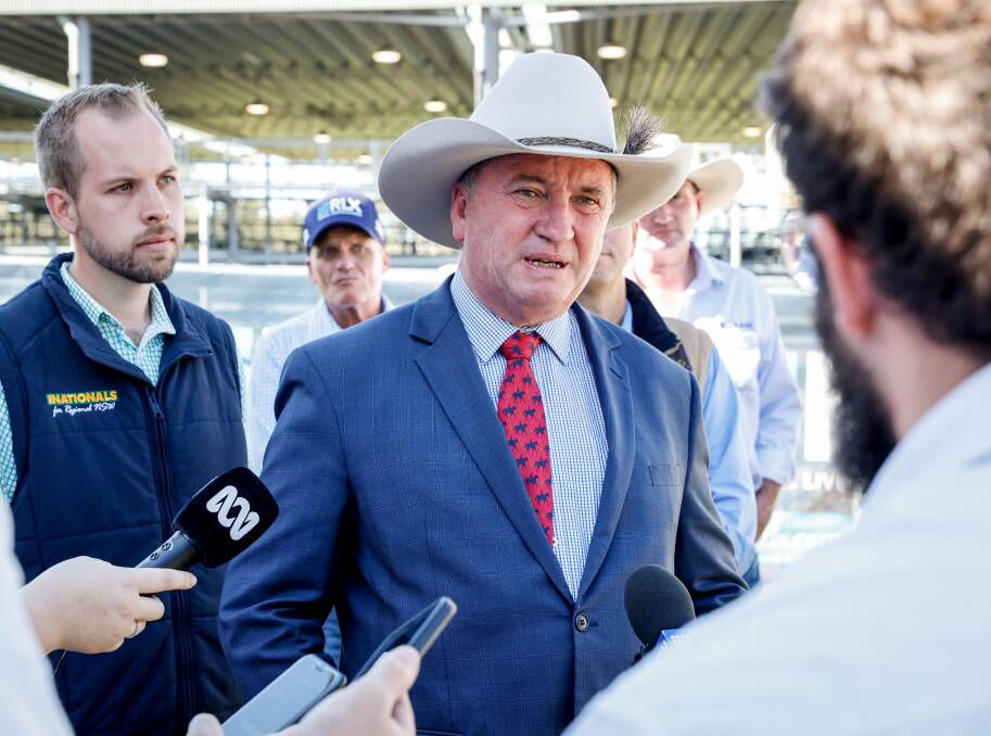Barnaby Joyce, pictured at the Hunter Regional Livestock Exchange, said more biosecurity money would be need to keep foot and mouth out.