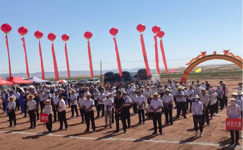 Paul Niven was invited to a groundbreaking ceremony for a new dairy farm in the middle of the desert. The event was complete with a "dial-a-crowd" bused in for the ceremony. Photo: Paul Niven.