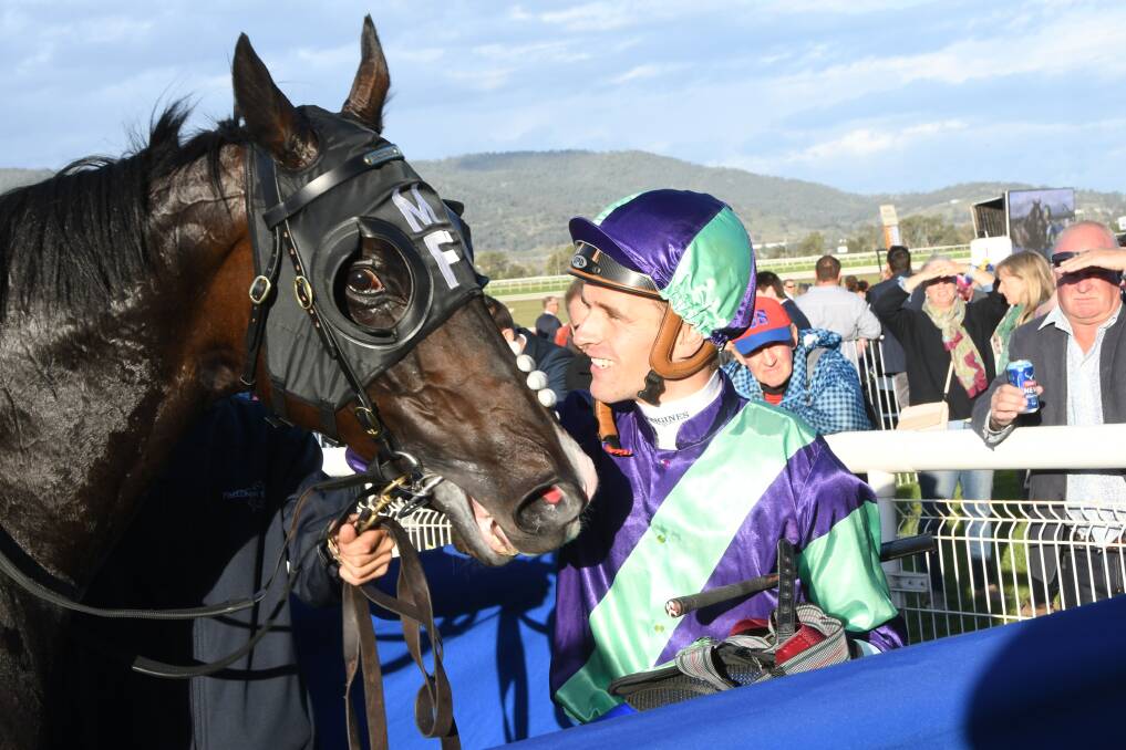 Jockey Sam Clipperton gives Special Missile a pat after the pair win the Scone Cup Listed Race on Friday. Photo Virginia Harvey