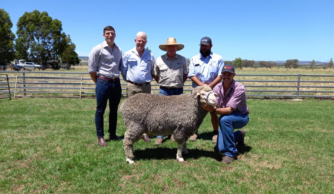 Sam Ballinger, AWN, John Croak, AWN, John Rosberg, Schute Bell, Todd Clark, Schute Bell and Waverley Downs Merino Stud owner James Ballinger, with the sale topping ram that made $4000. Picture supplied