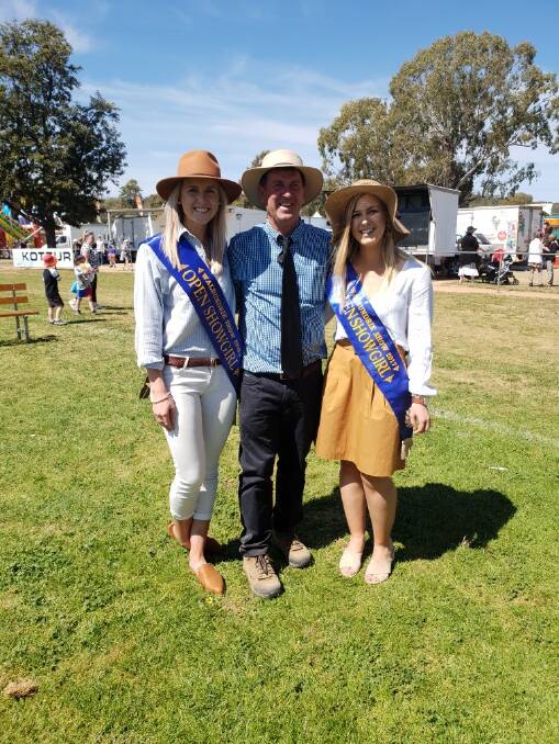 Stephanie Clancy with her father Rick Clancy, who is also the vice-president of the Walbundrie Show Society and Walbundrie's 2018 showgirl Sophie Trethowan.