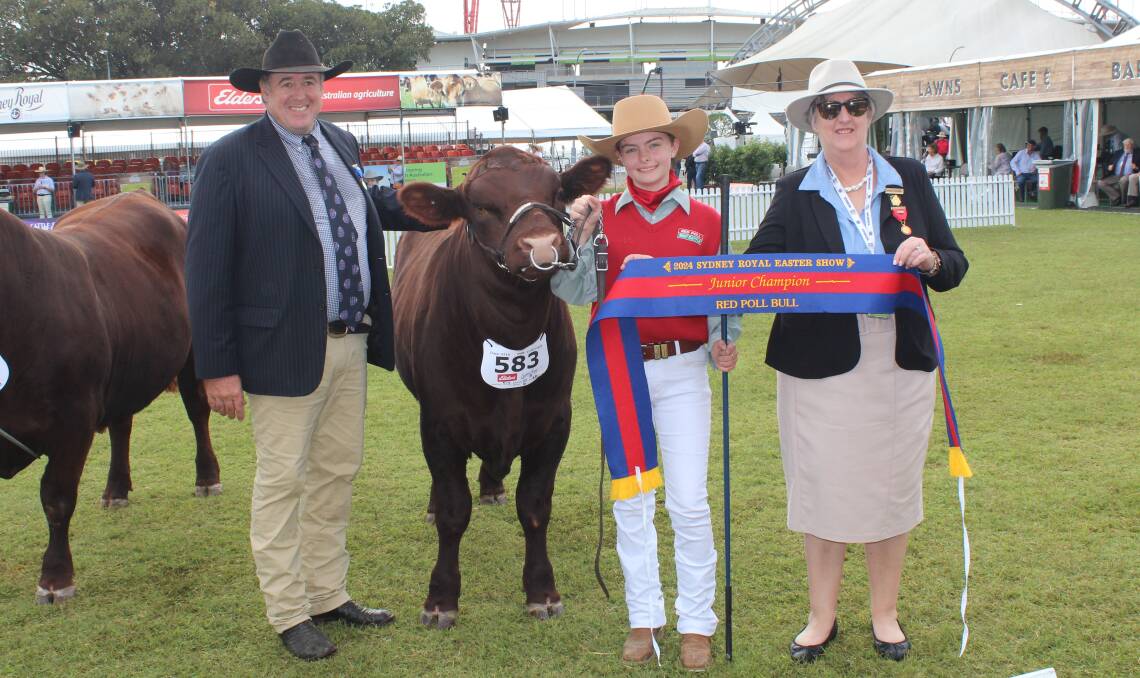 Judge Nicholas Job, Yeoval, Trinity Power, Springwood, and Karina Moore, Camden, with the junior champion bull. Picture by Hayley Warden