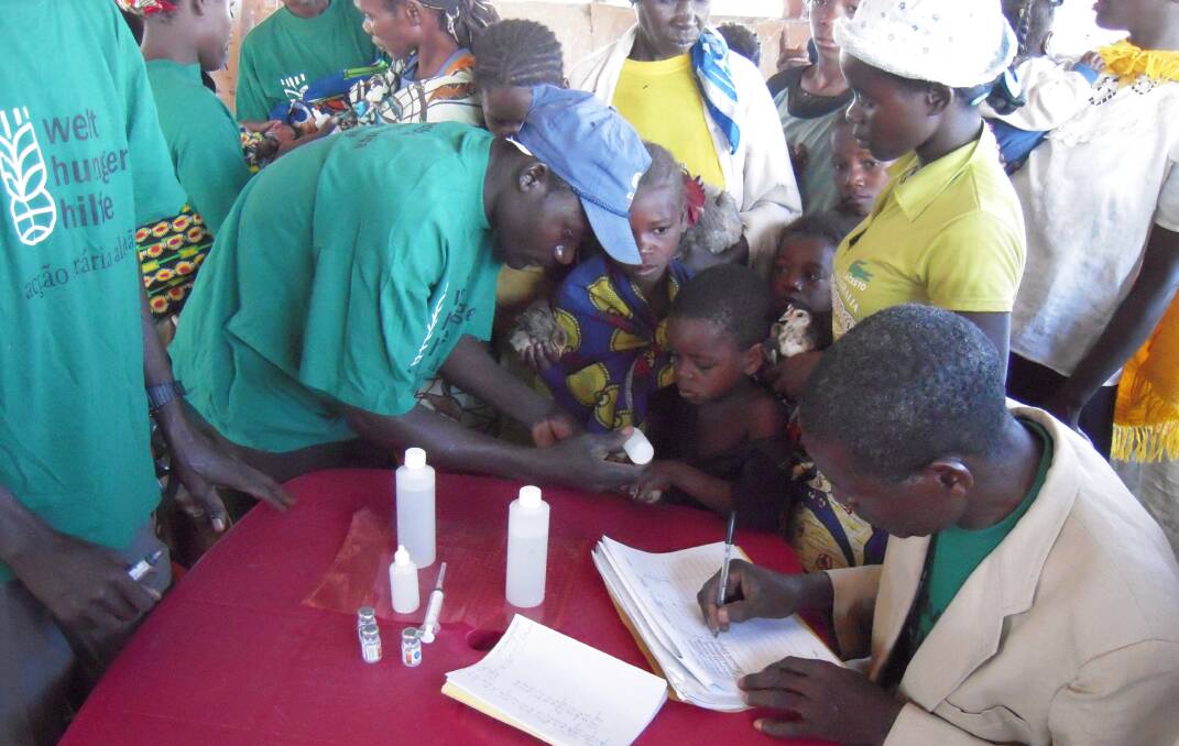 A community in Angola gathers for vaccination day in 2012. Picture supplied 