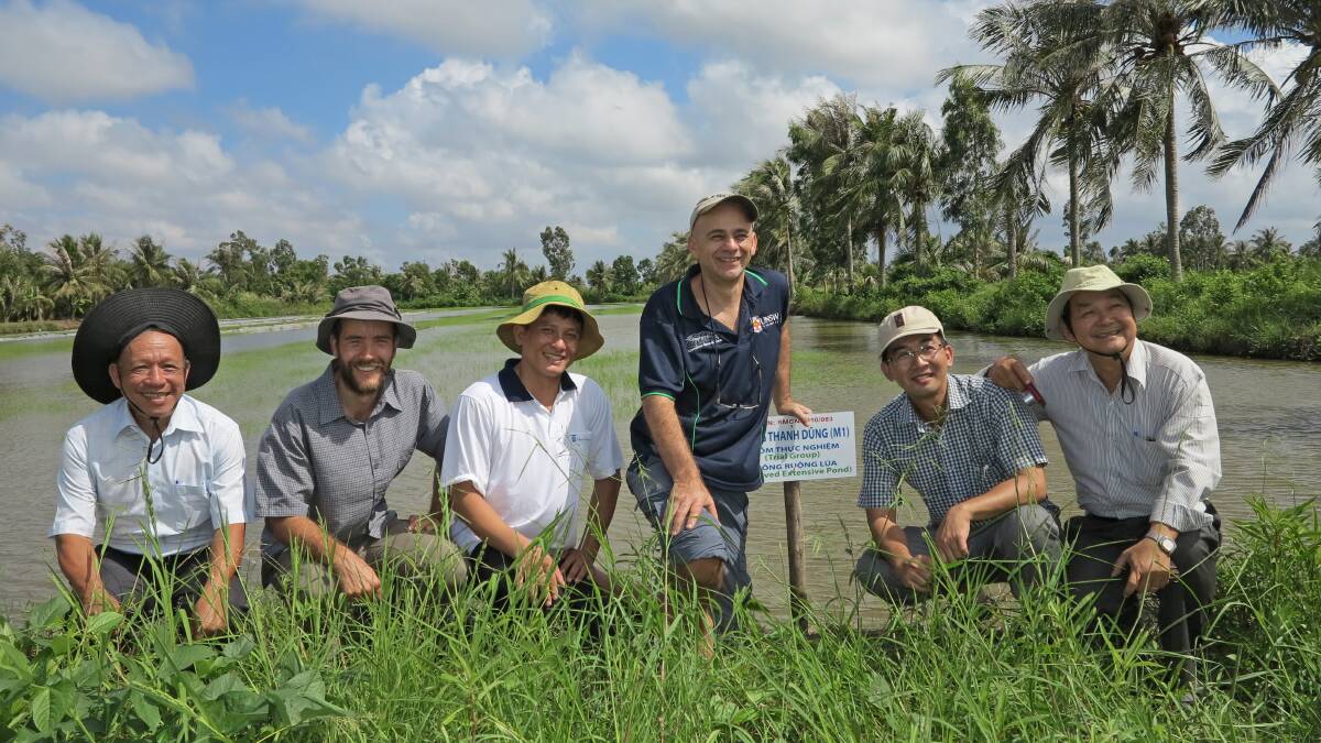 Dr Jason Condon (second from left) and the rice prawn project team on an ACIAR-funded project in the Mekong Delta in 2018. Picture supplied