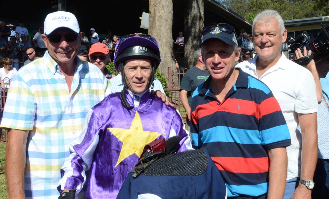 Part-owners Doug Griffiths and Steve Bowers flank winning jockey Andrew Gibbons and trainer Wayne Wilkes after Lucciola Belle wins the Mid-North Coast Racing Association’s Country Championship Qualifier. Photo Virginia Harvey