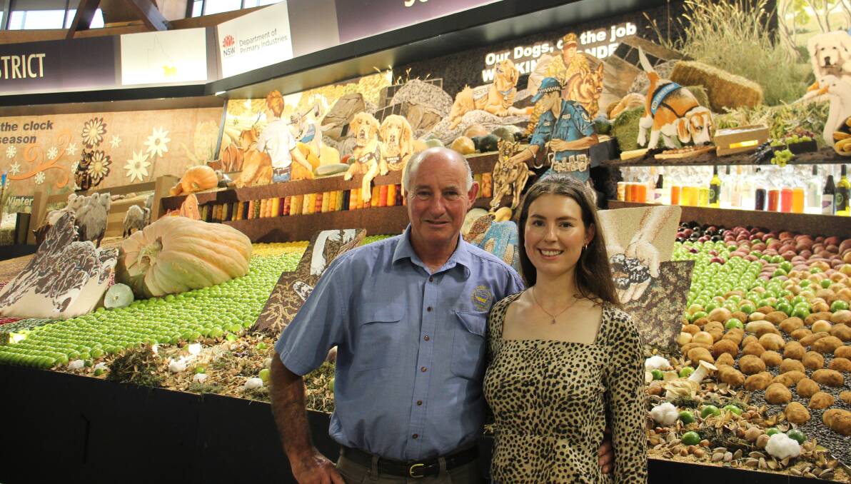 Ken Hewitt, Grabben Gullen, and Emma Lipscomb, Currawang, with the Southern District exhibit. Picture by Hayley Warden