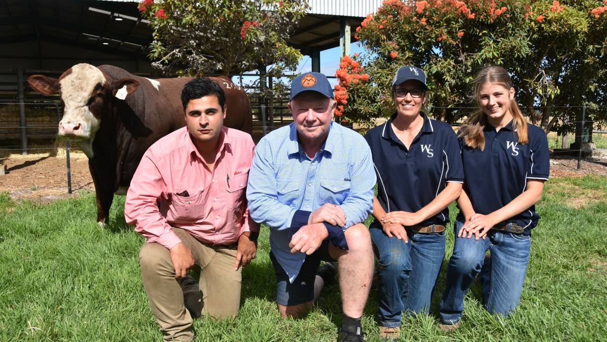Elders stud stock's Ryan Bajada and John Leek, Mt Ararat Simmentals Nar Nar Goon, Vic, bought charity lot, Woonallee Raffa. They are pictured with Lizzy and Olivia Baker, Furner, SA. 