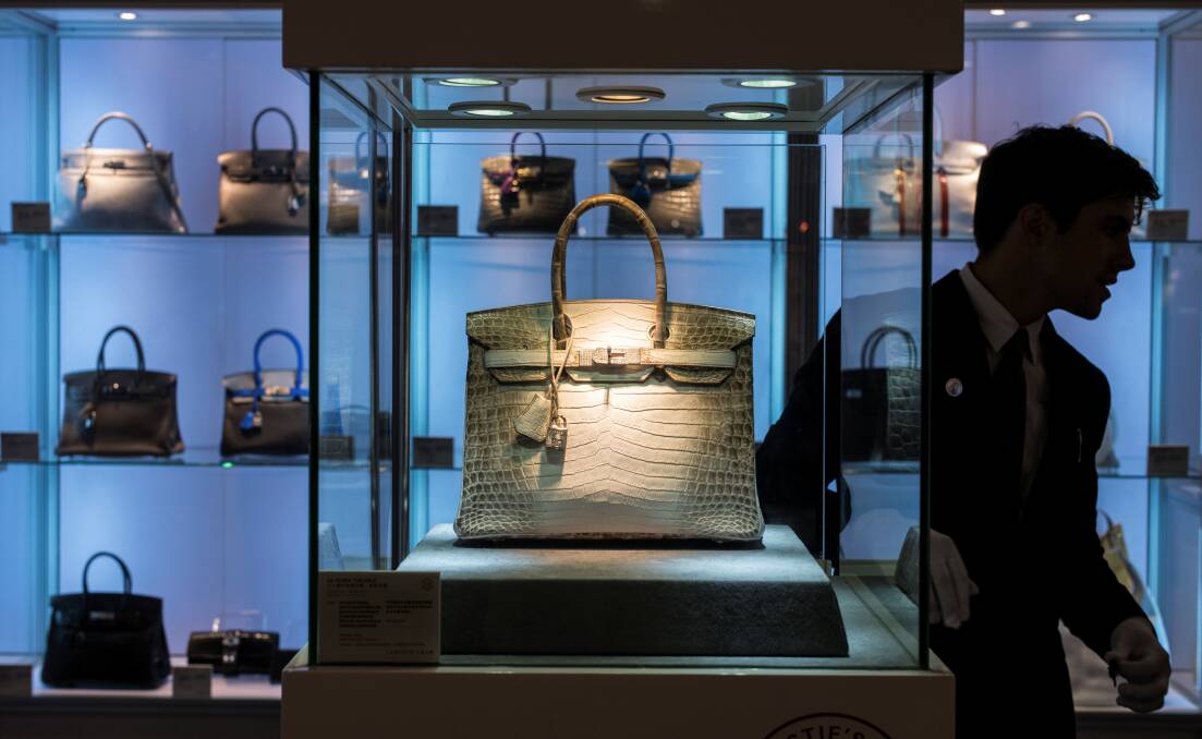 THIS Hermes Birkin crocodile handbag set with diamonds, on display at the Christe’s Auction in Hong Kong, sold to a private collector for a total of $300,168, just over the standard retail price of $280,000. 