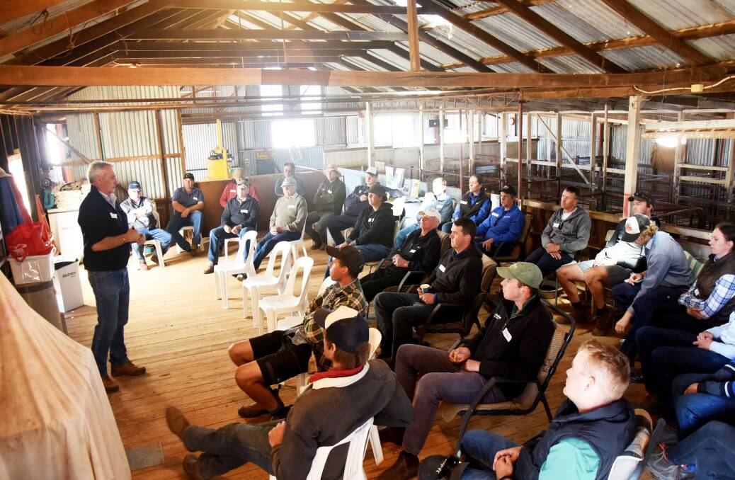 FUNDING DEBATE: AWI sheep expert Stuart Hodgson speaks to a group of mainly young wool growers in central Victoria.