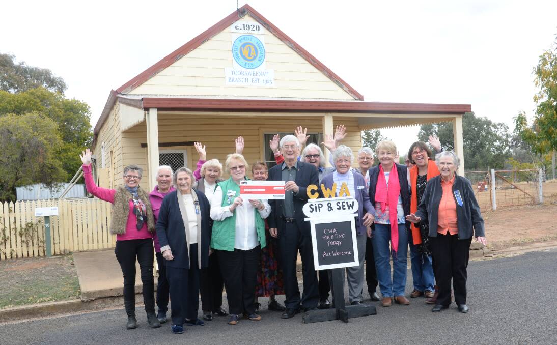 Dick Smith with the Tooraweenah Country Women's Association branch members. On Wednesday Mr Smith donated $1 million to the CWA of Australia and $5000 to the Tooraweenah branch.
