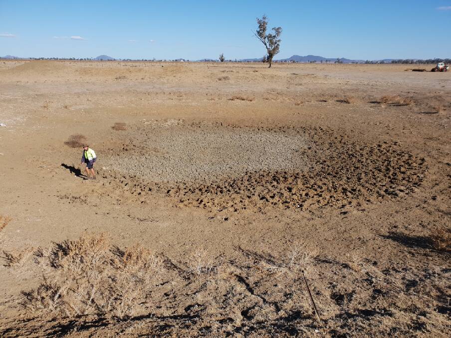 A dry dam at Goolhi gives an indication of just how difficult it is to water stock and images like this inspired the idea to bring in road trains of stock water.