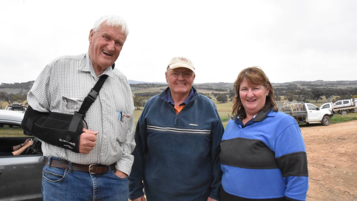 Peter Jackson with Mervyn and Anne O'Hara - the O'Haras are firm believers that it will rain.
