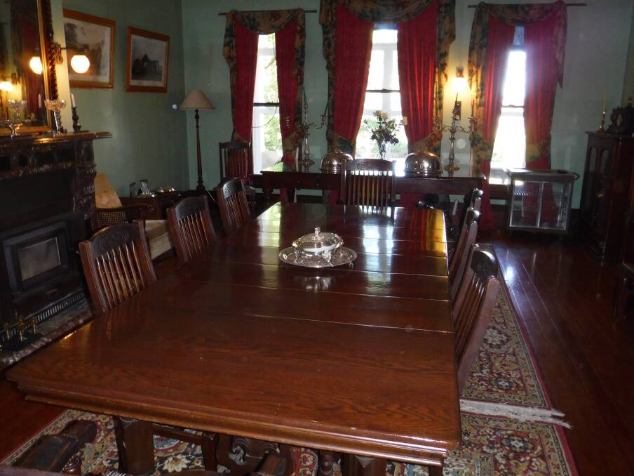 A large oak extension dining table with eight leaves and turned wooden legs on ceramic castors, a grand addition for a large room, will be offered for sale.