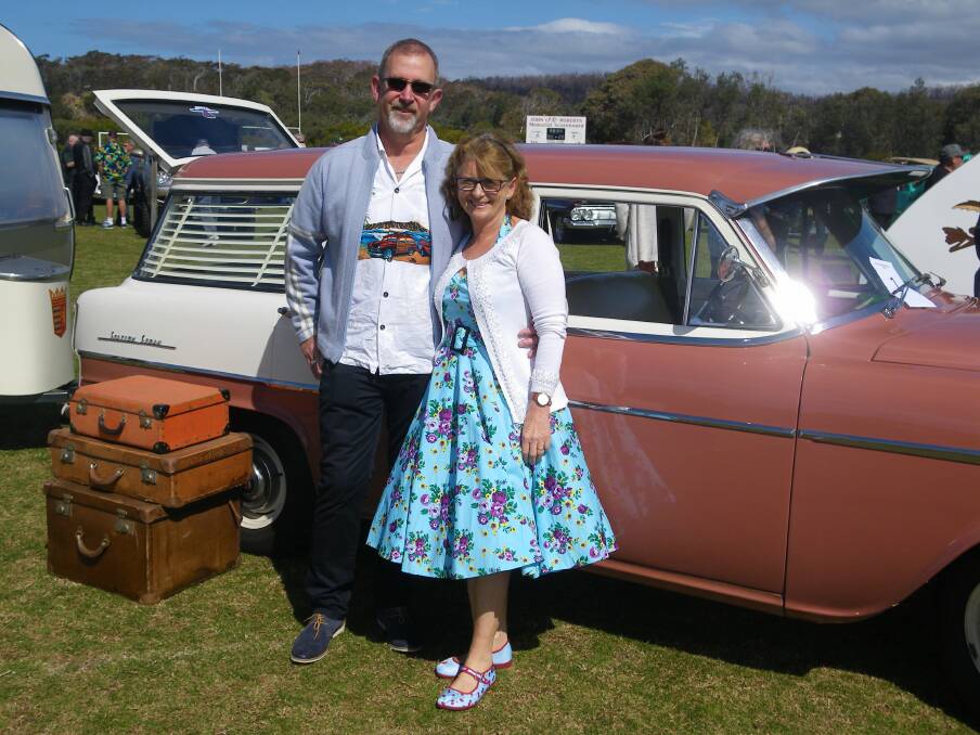 Anthony and Kathy Dack with their 1959 FC Holden station wagon. The Dacks lost their home in the Tahra bushfire. In the fire's wake, Bega Valley Shire Council has reduced fees for rebuilding permissions to about 10 per cent of normal.
