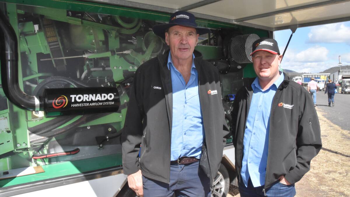 Chris Burchell and Richard Nagorcka at the Tornado Harvester Airflow System exhibit at AgQuip. The men remain convinced the units are the answer to harvester fires.