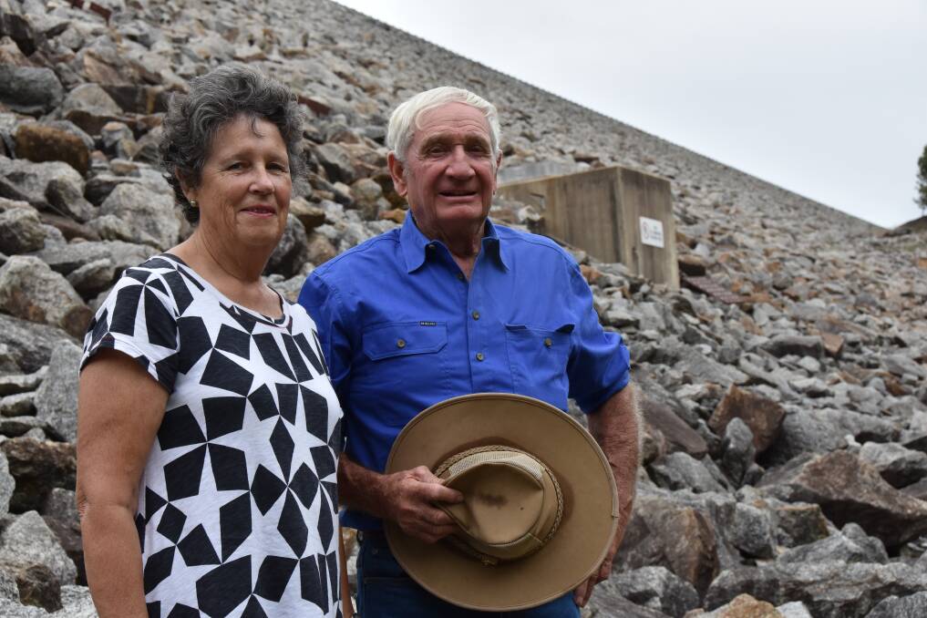 Sue and David Webster at the base of Wyangala Dam wall. They fear raising the wall will destroy some of the most valuable country on land that has been farmed by the family for five generations. Photo: Daniel Pedersen