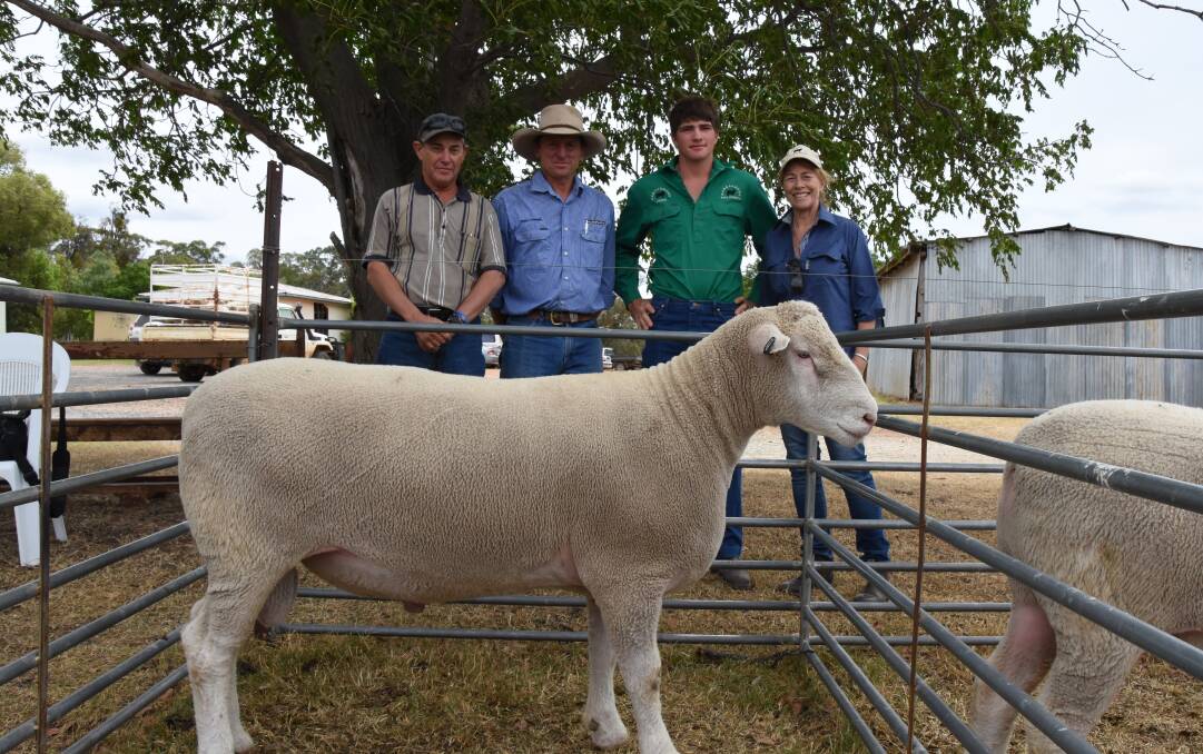 Stock manager Robert Naef, "Wongaboori", Mendoran, Milling Stuart agent Jamie Stuart and Toby and Christine Leary with the top-priced ram that fetched $2300 at Friday's sale.