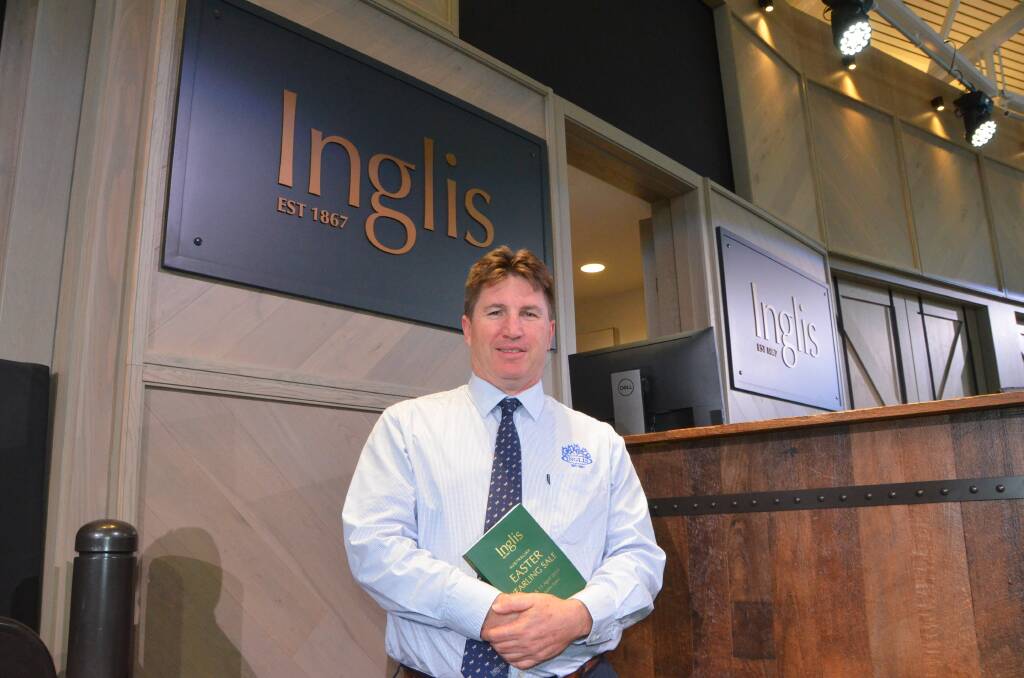 Inglis managing director Mark Webster in front of Riverside Stables auctioneers' box in the selling auditorium at Warwick Farm. Photo: Virginia Harvey 
