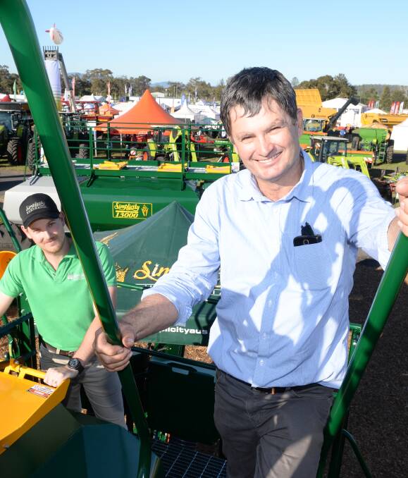 Simplicity Australia sales manager Cameron Jordan, Dalby, Qld, and Neil Westcott, "Swansea", Alec Town, take a look at the TB3 30,000L airseeder while at the Agquip Field Days. Simplicity will release the airseeder this week. 
