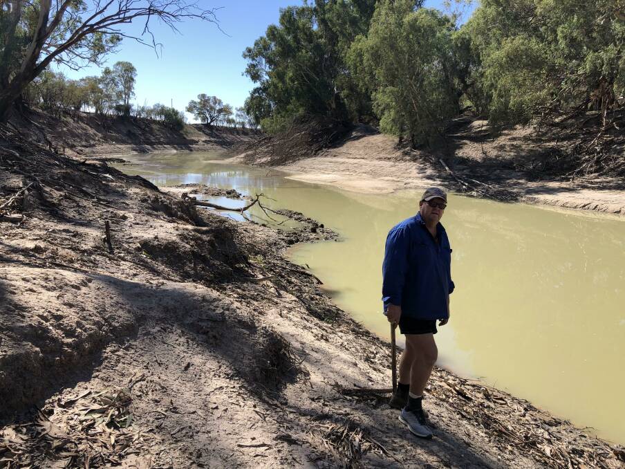 Australian Floodplain Association president Justin McClure on the banks of the Darling River, Kallara Station, Tilpa.