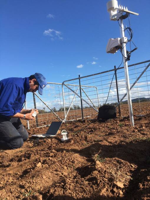Tim Bartimote installs a capacitance probe at a trial site south west of Bogan Gate.