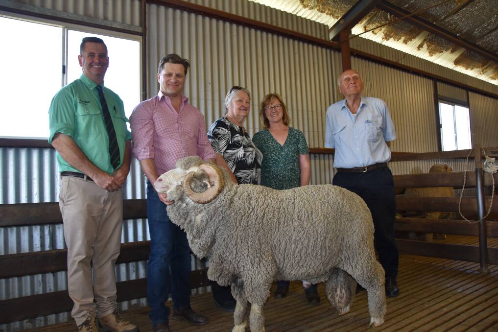 Nutrien Ag stud stock agent Rick Power, David Picker, Joan Price, Megan Picker and Don Price with the top-priced ram that sold for $4000.