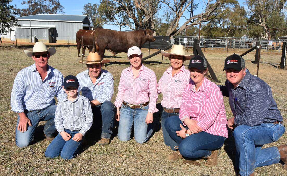 Jason Catts, Beau Woodiwiss, 8, Riley, Jessica and Kylie Catts with Rebecca and Reg Woodiwiss, in the background is the $18,000 priced Futurity Moonlight M278, bound for Tasmania. 