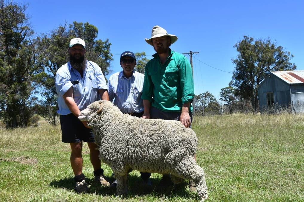 Schute Bell agent Todd Clarke, vendor James Stewart and buyer Charlie White from Tangley Grazing Company, Guyra.