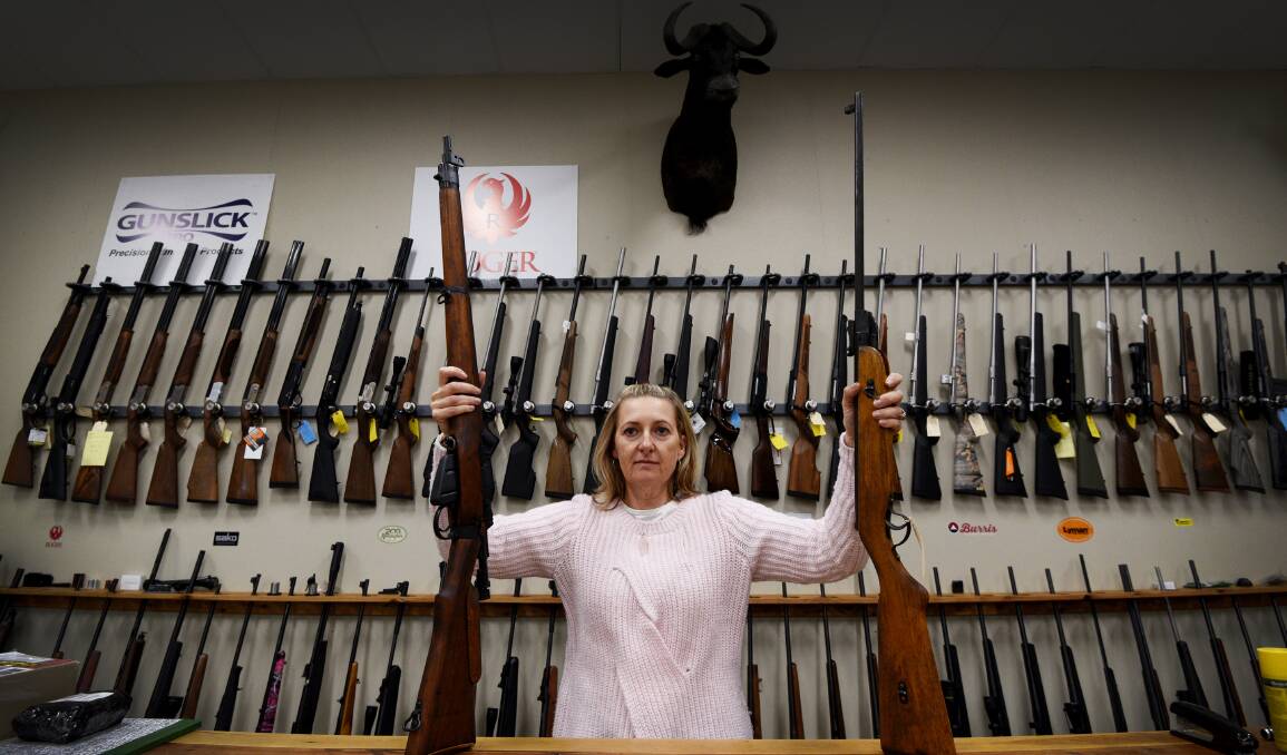 Gun ho: Calibre Country's Jodie Mearns is a one of the licenced firearms dealers that have seen a dozen inquiries a day about registering old guns. Photo: Gareth Gardner
