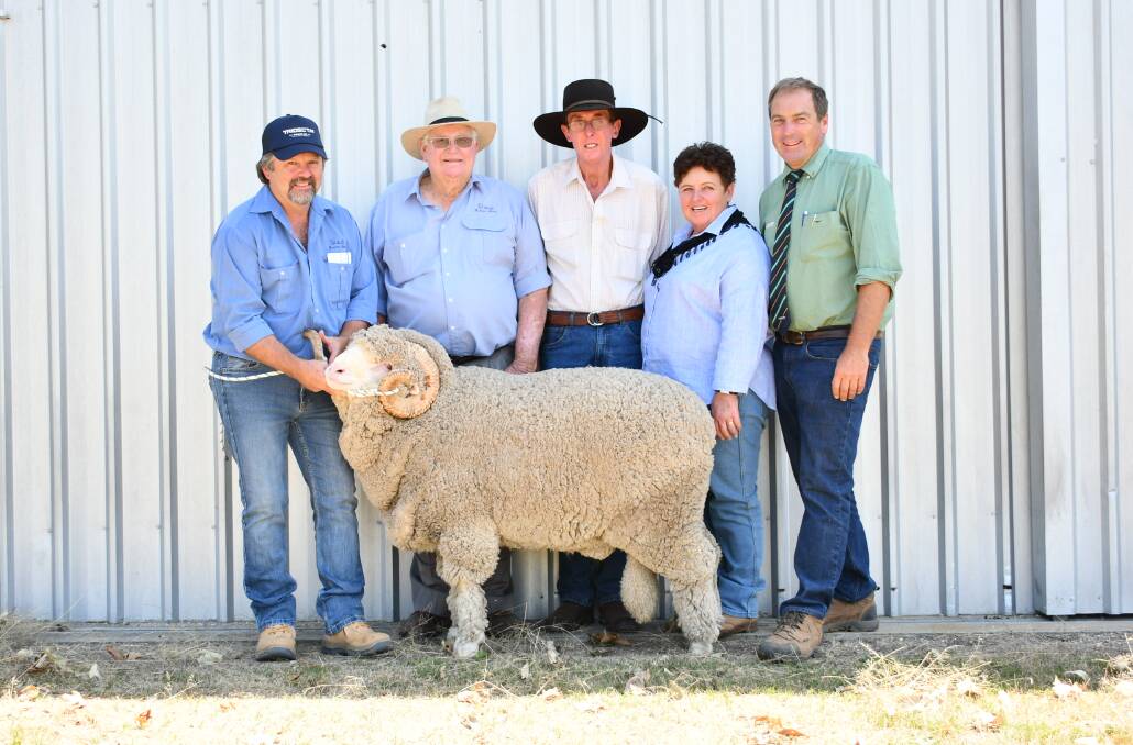 Scott Matthews and Leo Blanch of Westvale Merinos with buyers Chris Dunne and Linda Waters, Enmore and Landmark's Angus Carter with the $3300 ram.