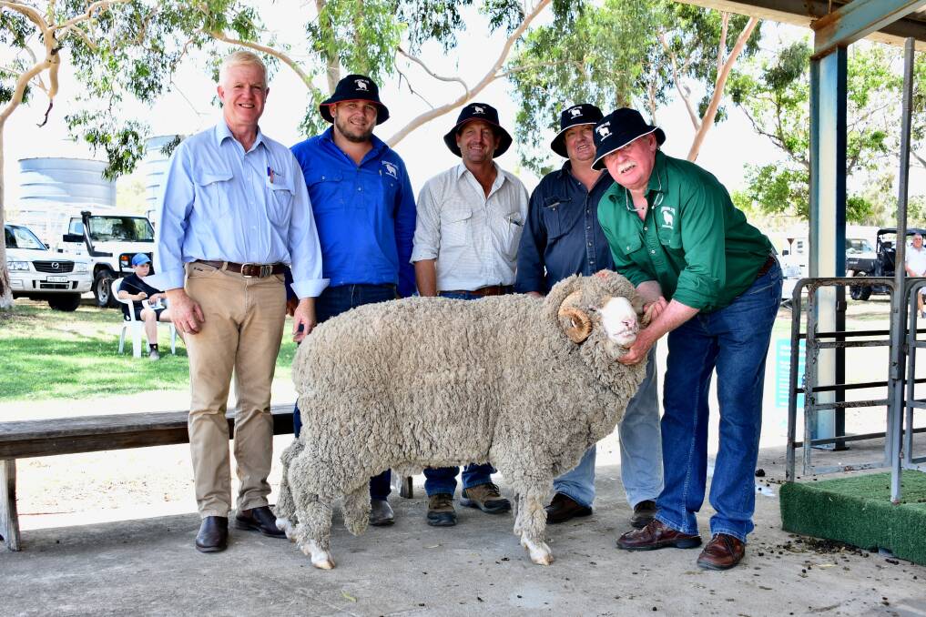 AWN's John Croake, Jade Lane, buyers Barry and Stephen Hoy and vendor Rodney Kent with the top ram.