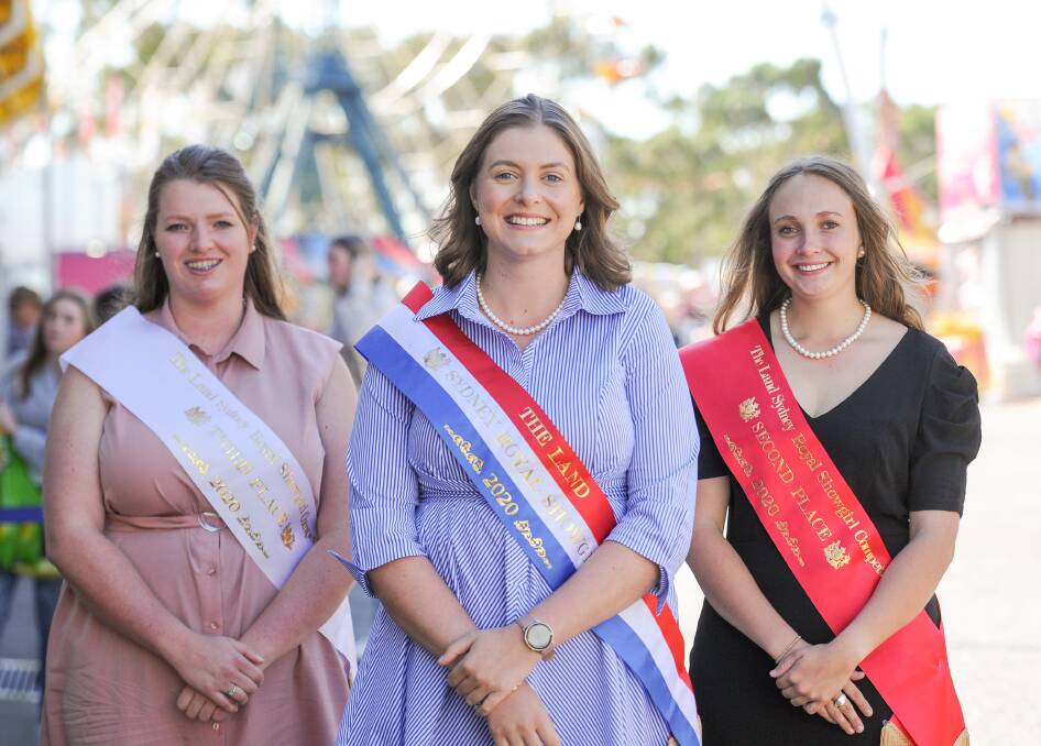 The 2020 The Land Sydney Royal Showgirl Jessica Neale, Cootamundra, with second runner-up, Kate Webster, Wagga Wagga, and first runner-up, Steph Ferguson, Bathurst.