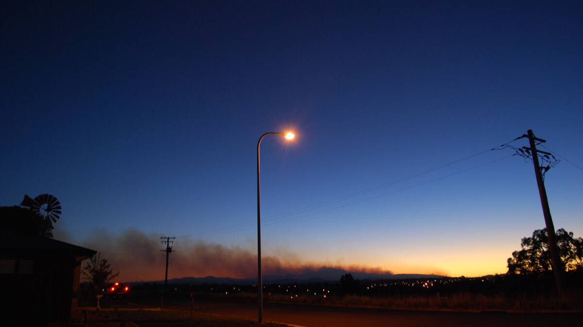 The view towards Mount Canobolas at sunset from Orange. The situation has been reduced to watch and act.