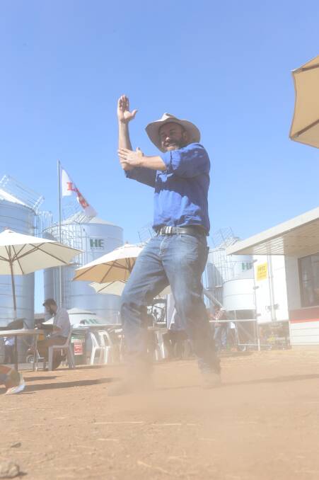 It's all about the moves: Coonamble's James Nalder cuts up the rug (... or dust) at AgQuip in the name of the Coonamble Rain Dance. Photo: RACHAEL WEBB.