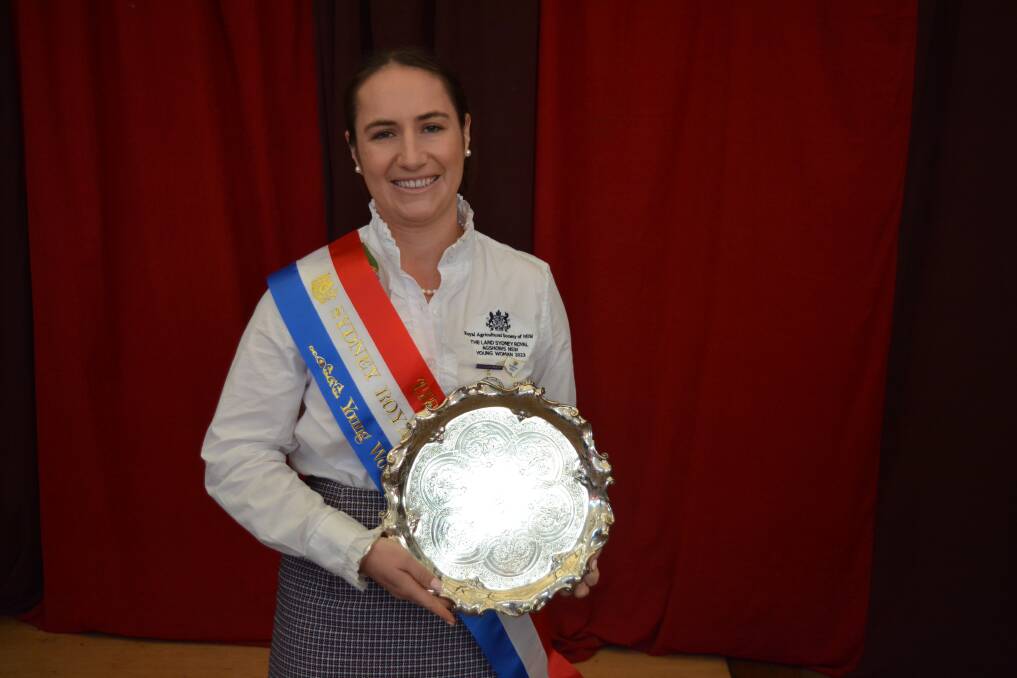 The 2023 The Land Sydney Royal AgShows NSW Young Woman with the silver salver trophy.