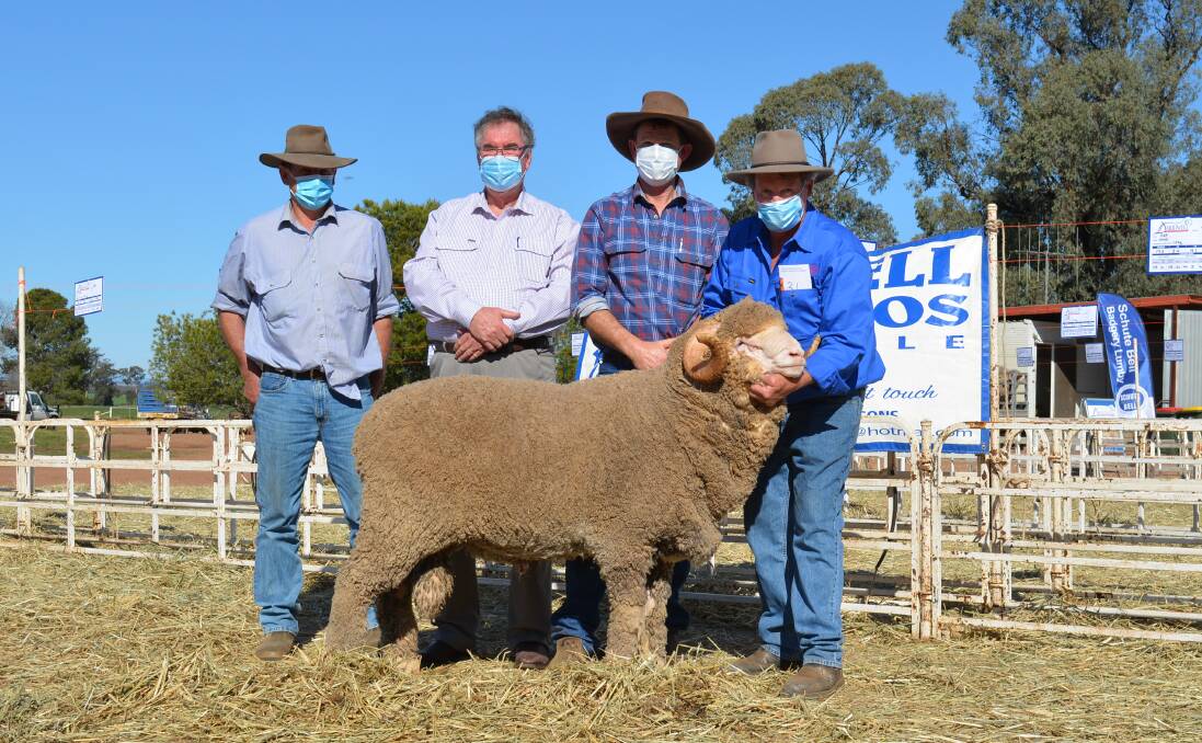 John Macarthur, Narromine, Peter Morley, Boomey Park, Molong, his property manager, Angus Shannon, and Russell Jones, Darriwell Merinos, Trundle, with the $20,000 sale topper.