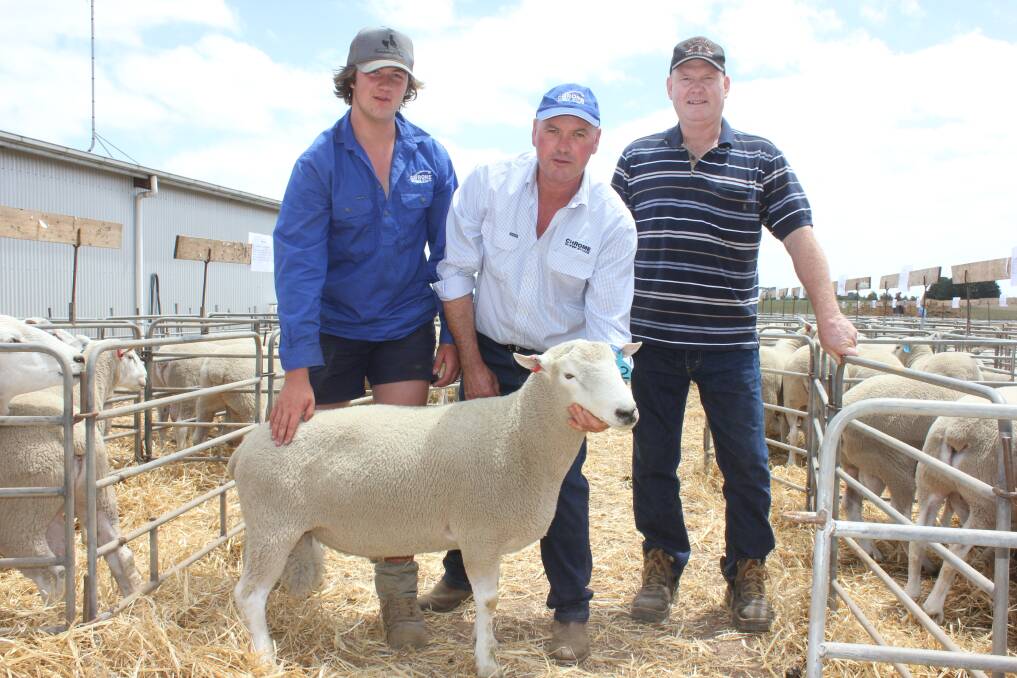 TOP SIRE: Jake and Matt Tonissen with client, Richard Kelleher and the top-priced Chromedale ram at $3400.