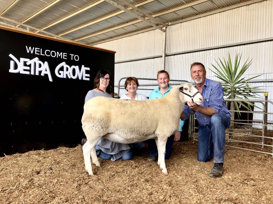 TOP EWE: The top ewe, with the Pipkorns and Hopea Down's Ellie and Paula McDonald.