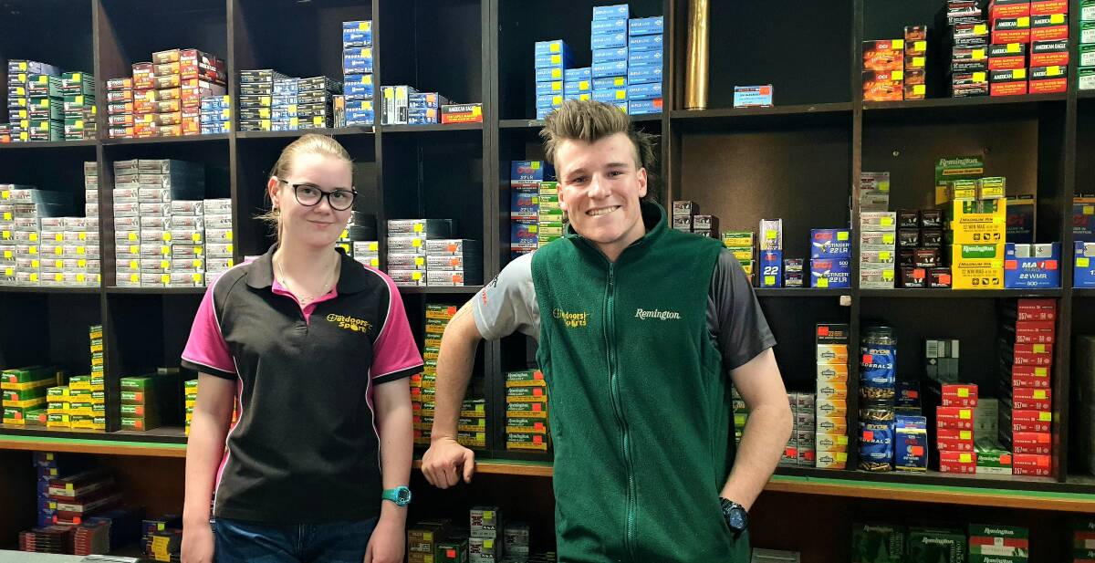 Roma Outdoors and Sports staff Molly Fulwood and Jackson Nicholls are preparing to deal with customer frustration following FedEx's decision. Photo: Sally Gall