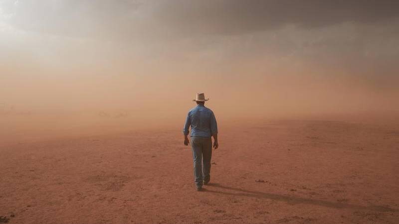 This image of a farmer in a dust storm in the central west of NSW won the 2021 National Photographic Portrait Prize.