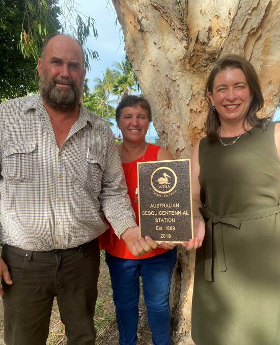 Rob and Lyn French, Gilberton, Einasleigh, accepting the Australian Century Farm and Station Awards plaque from Senator Susan McDonald.