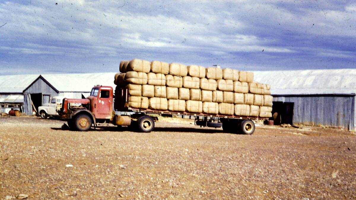 A carrier pictured with a load of wool beside the Warbreccan woolshed.